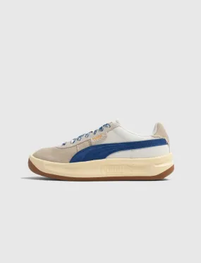 PUMA GV SPECIAL GRUNGE LMC WARM WHITE/CLYDE ROYAL $130.00  $91.00 This item is on final sale, it cannot be exchanged or return