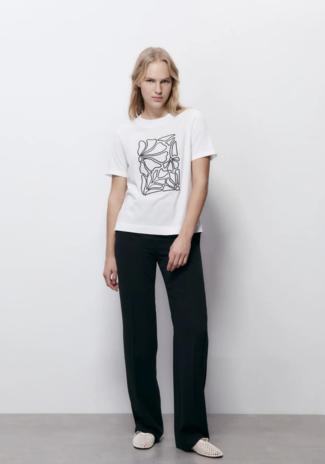 The result is Silhouette T-shirt with embroidered design.